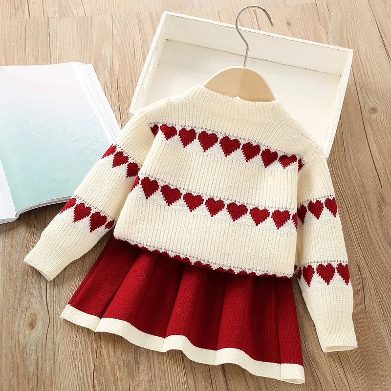 Girls' sweater set for autumn and winter, new western-style children's heart-shaped long sleeved knitted top+short skirt two-pie